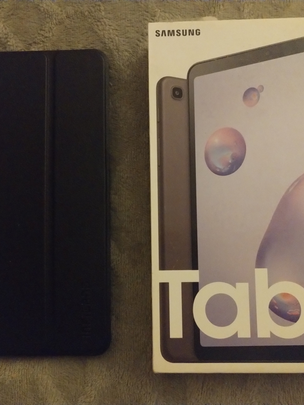 Samsung Galaxy Tablet A With A Black Protective Case